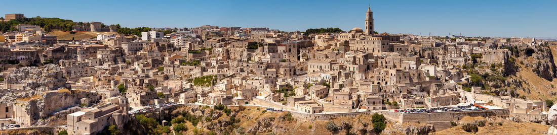 Panoramic view of historic buildings against sky