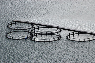 High angle view of ferris wheel in sea