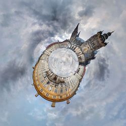 Low angle view of cathedral against cloudy sky