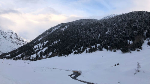 Snow covered mountains against sky