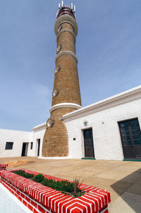 Low angle view of historical building against blue sky