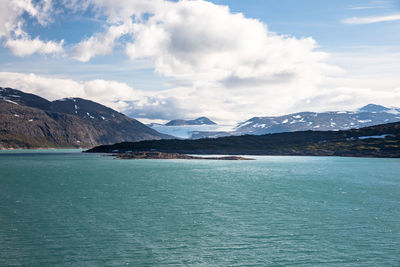 Scenic view of mountains against sky during winter