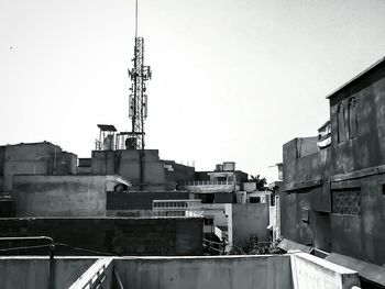 Buildings against clear sky