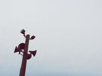 Low angle view of street light against clear sky
