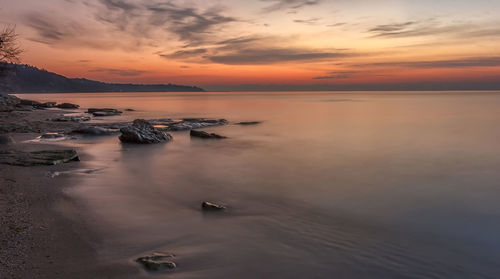 Scenic view of sea against sky during sunset