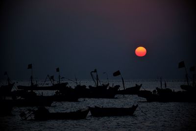 View of calm sea at sunset