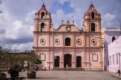 Facade of historic building against sky