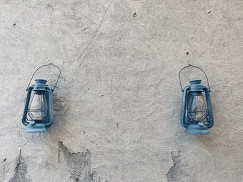 Lantern hanging on wall