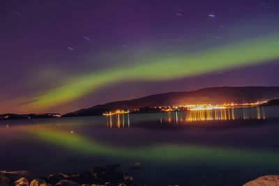 Scenic view of sea against sky at night