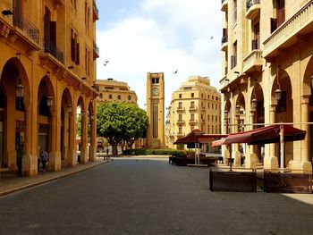 Road in city against sky