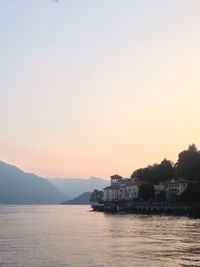 Scenic view of sea against clear sky during sunset