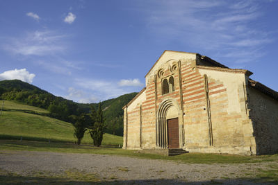 Exterior of historic building against sky