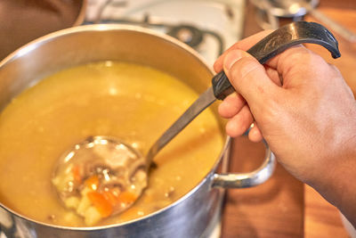 Close-up of man preparing food