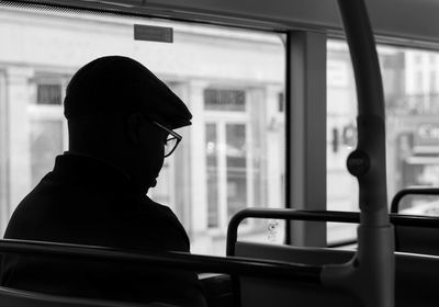 Man sitting in bus