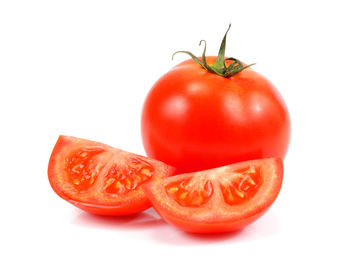Close-up of tomato against white background