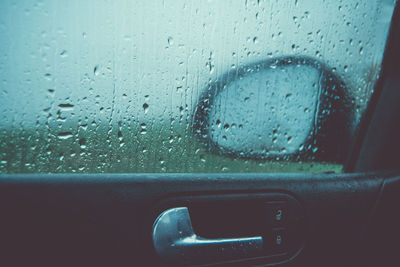 Close-up of wet car window