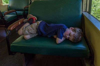 Boy sleeping in seat