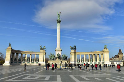 Group of people in front of historical building