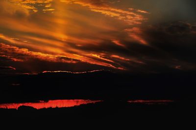 Scenic view of dramatic sky during sunset