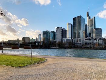 Modern buildings in city against sky