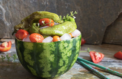 Close-up of fruits in bowl on table