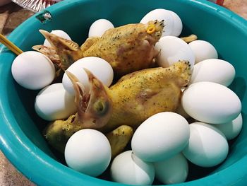 High angle view of eggs in plate