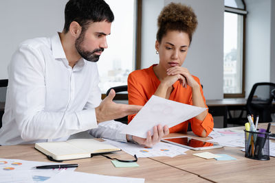 Business colleagues working at office