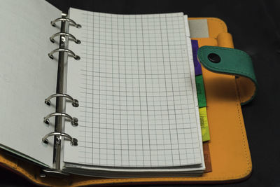 High angle view of pen on paper