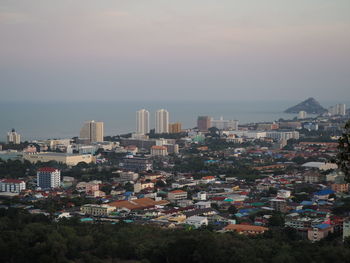 High angle view of buildings against sky during sunset