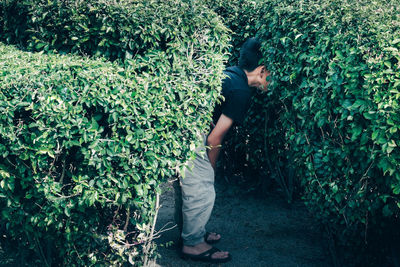 Side view of man standing on land