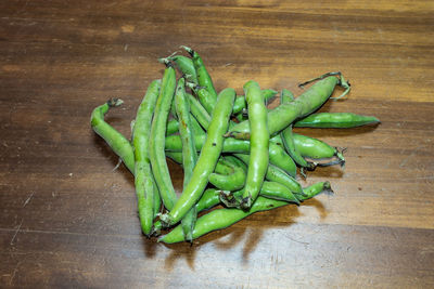 High angle view of green chili pepper on table