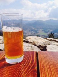 Close-up of beer glass on table