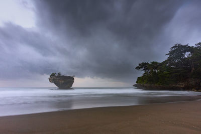 Scenic view of sea against sky and cloud