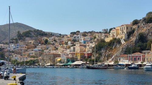 Boats in front of buildings in town