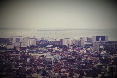 View of cityscape by sea