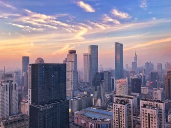 Aerial view of city at sunset