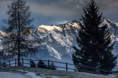 Scenic view of snowcapped mountains against sky during winter