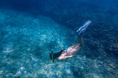 High angle view of person swimming in sea