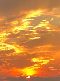 Low angle view of dramatic sky during sunset