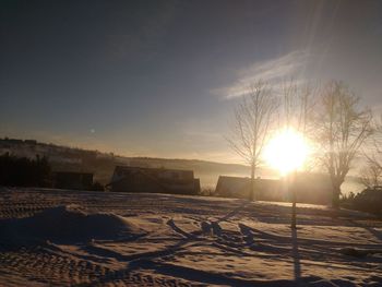 Scenic view of landscape against sky during sunset