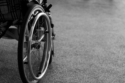 Close-up of bicycle on street