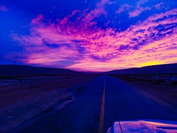 Road against sky during sunset