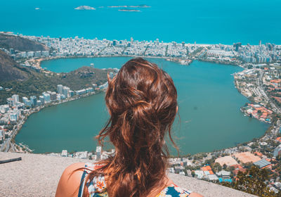 Rear view of woman looking at sea