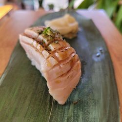 Close-up of sushi served on table