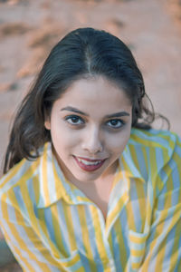 Portrait of smiling young woman