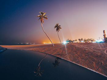 Scenic view of sea against sky at night