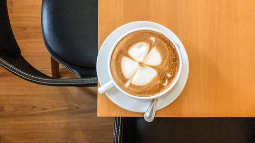 Directly above shot of cappuccino on table