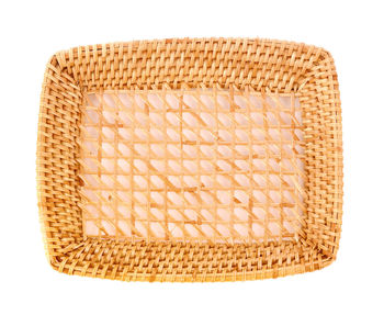 Directly above shot of wicker basket on white background