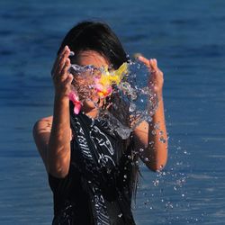 Reflection of woman in water