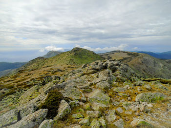 Scenic view of rocky mountains against sky